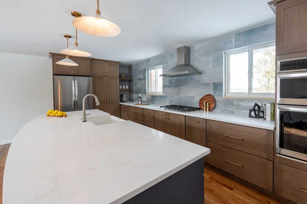 A new island with beautiful curved countertop.