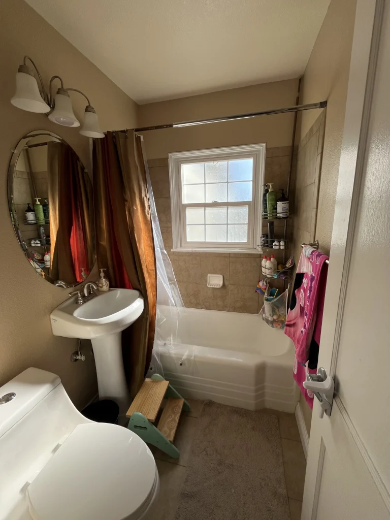 Before view of the hallway bathroom