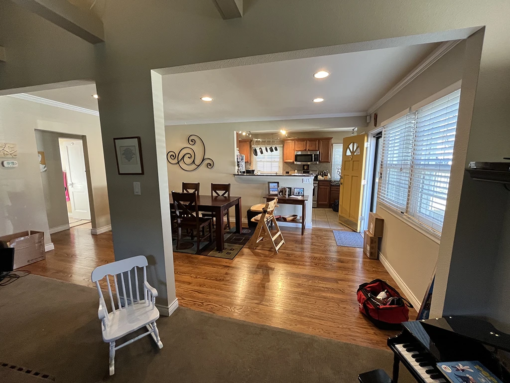 Looking through the living room and dining room to the kitchen.