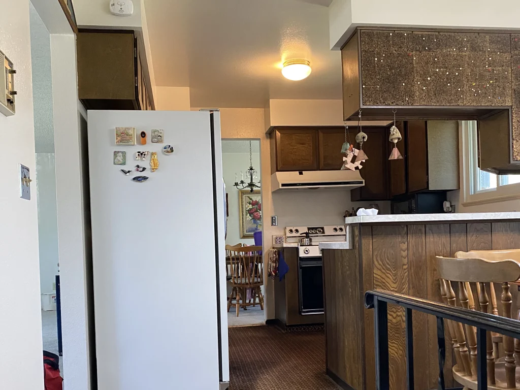 Before the remodel, a different angle of the kitchen